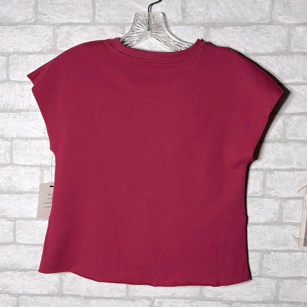 Free Assembly peplum top short sleeve sweatshirt